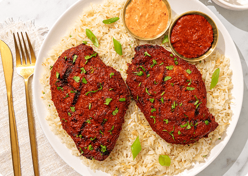 Grilled chicken plate with sauces