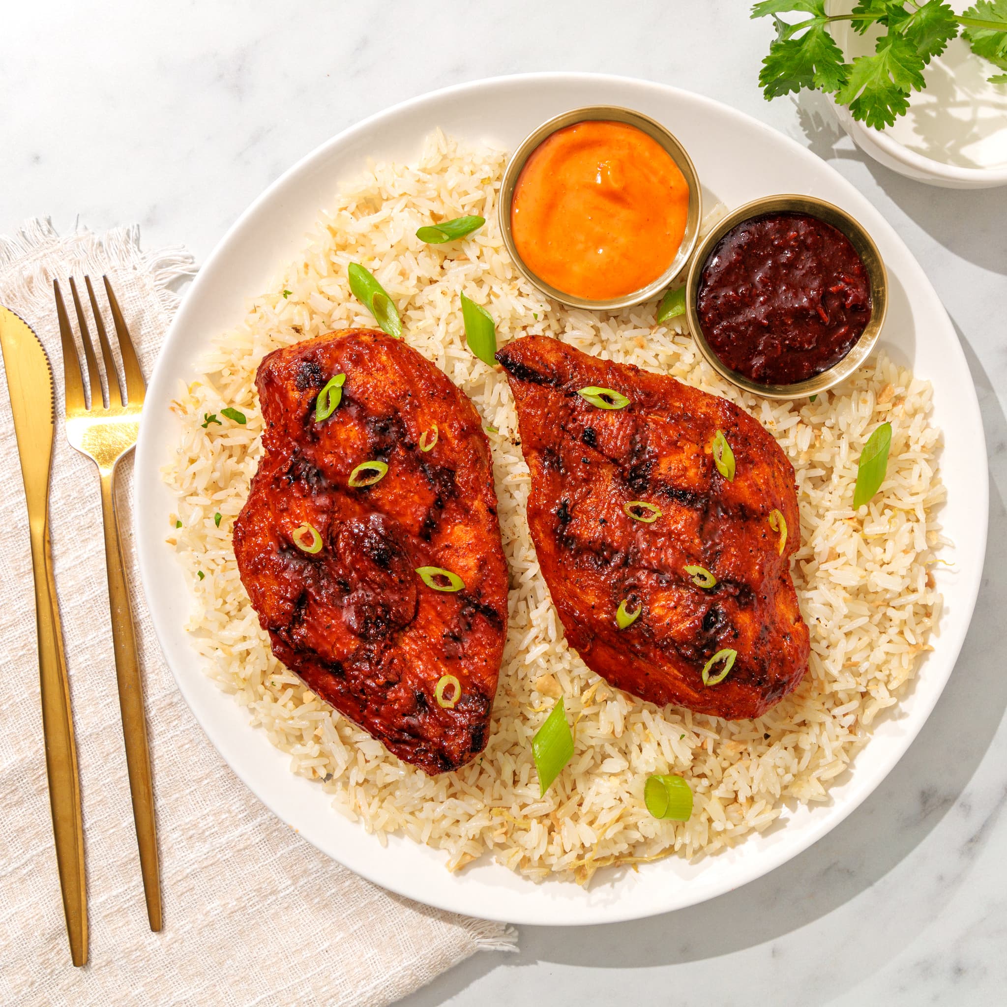 Korean Fire buldak grilled chicken breasts over rice
